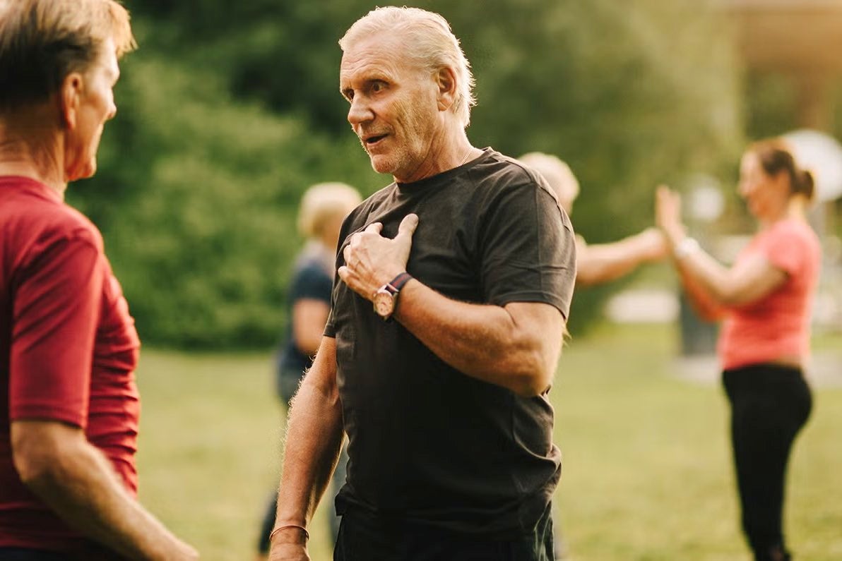 Man with hand over heart