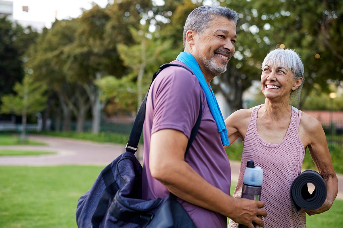 Older couple exercising outdoors